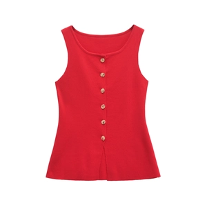 Detail of red knitted vest with round neck and golden single-breasted buttons
