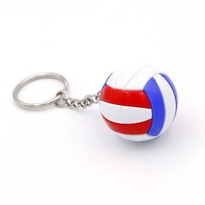 Detailed view of a mini red, white, and blue volleyball keychain with high-quality stitching