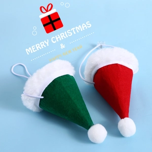 Green and red felt Christmas hats for pets with adjustable straps and white faux fur trim
