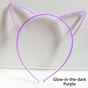 Close-up of the non-slip teeth on this purple glow-in-the-dark cat ear headband