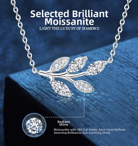 Detail of Moissanite leaf pendant in 925 sterling silver with 3EX grade cut