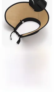 Detail of adjustable chin strap and breathable straw weave on foldable sun hat