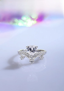 Macro shot of heart-shaped zircon crown ring in S925 sterling silver with micro-pave stones