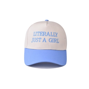 Detail of blue 3D embroidery Literally Just A Girl on beige cotton baseball cap