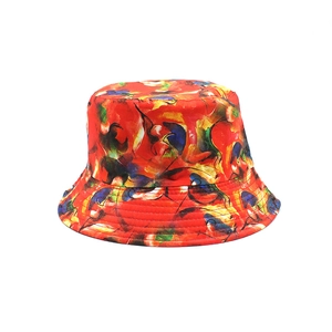 Close-up of abstract oil painting print and stitching on double-sided bucket hat