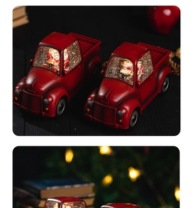 Detail of red vintage Christmas truck snow globe with LED lights and swirling glitter