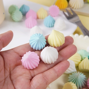 Colorful resin meringue candy drops in pastel macaron colors for DIY dessert decoration