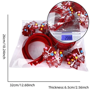 Detail view showing dimensions of festive Christmas headbands with sequins and mini trees