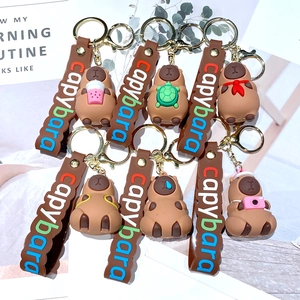 Cute Capybara PVC keychains set featuring various fun accessories like turtle and camera