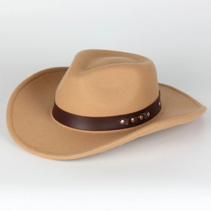 Detail of camel wool felt cowboy hat with brown leather band and gold metal studs