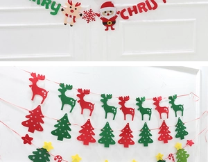 Detail of felt Christmas banner with Santa Claus, reindeer figures and green holiday trees