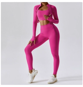 Detail view of magenta 3-piece yoga set with high-waist leggings and zip jacket
