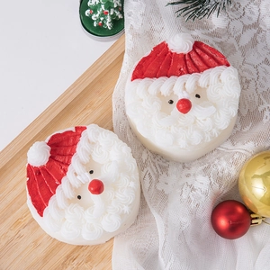 Creative Santa Claus scented candle on a wooden tray with festive Christmas decor