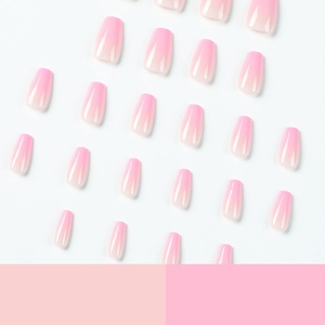 Pink and white gradient short ballet style press-on nails set on a clean white background
