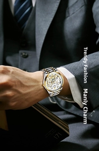 Detail of two-tone stainless steel automatic mechanical watch with multi-function dial