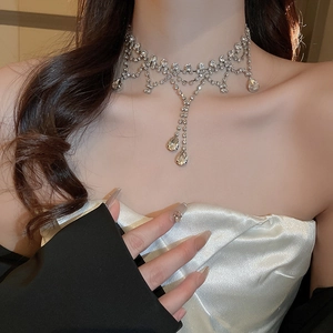 Luxurious silver tassel choker necklace featuring sparkling zircon and pear-cut rhinestones