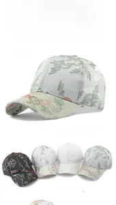 Detail of Chinese style mesh baseball caps with floral embroidery in four colors