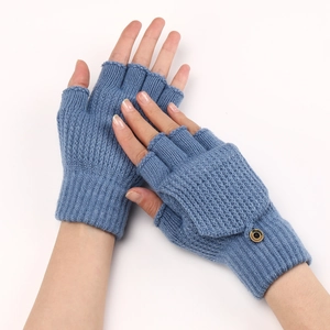 Detailed knit texture of blue convertible fingerless gloves with a button flip-top cover