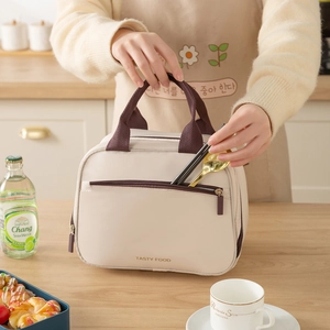 Insulated beige lunch bag with purple handles and Tasty Food print for school or work