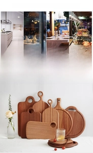 Various shapes of premium ebony wood cutting boards and serving trays for kitchen