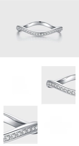 Macro detail of S925 sterling silver wavy ring with pave set cubic zirconia stones