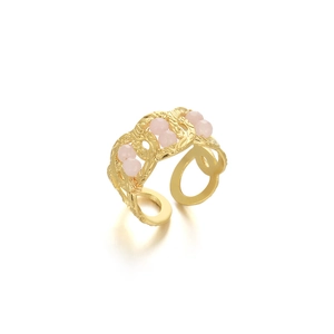 Detail of gold-plated stainless steel chain ring with pink beads and open adjustable design