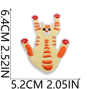 Detailed view of yellow tabby cat embroidery patch with precise size measurements