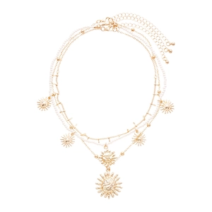 Three-piece gold multilayer necklace featuring faux pearls, sun charms and portrait pendants