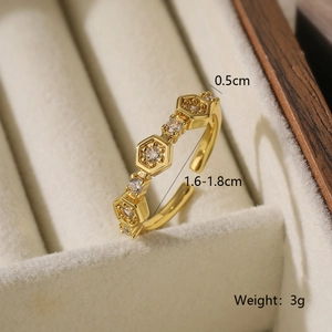 Detail of 0.5cm hexagon honeycomb ring in gold plating with white zircons