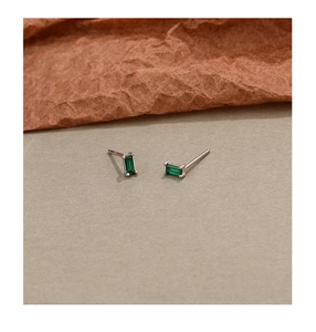 Detail showing rectangular emerald green zircon stud earrings in S925 sterling silver
