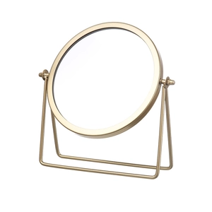 Nordic gold iron vanity mirror with a round HD glass surface and stable tabletop stand