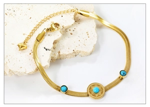 Detail von 18K Gold Schlangenkette Armband mit Türkisstein und Sonnenstrahl-Design