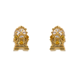 Macro detail of rose gold earrings with micro-set zircons in unique clock character shape