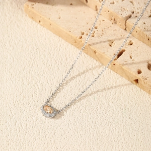 Elegant S925 sterling silver necklace with oval champagne stone and diamond halo