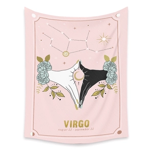 Detail of pink Virgo zodiac tapestry with celestial flowers and constellations