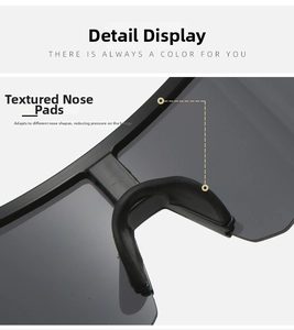Detail of ergonomic anti-slip rubber nose pads on matte black cycling sunglasses
