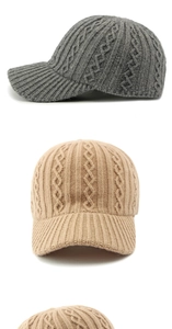 Detail of cable knit patterns on grey and beige thermal winter baseball caps