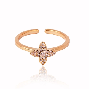 Rose gold adjustable clover ring featuring emerald green and white zircon stones