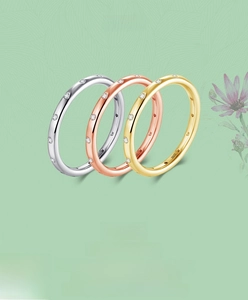 Detailed view of S925 sterling silver bands in silver, gold, and rose gold with pavé stones