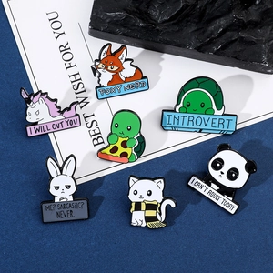 Detailed close-up of cute cartoon animal enamel pins with humorous English slogans
