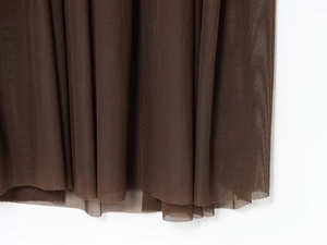 Detailed macro view showing the multi-layered coffee brown mesh fabric and fine tulle texture
