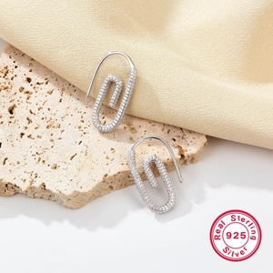 Elegant S925 sterling silver paperclip earrings with zircon on beige stone and silk