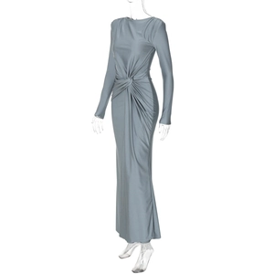 Detail view of twist knot waist and elegant draping on grey-blue long sleeve maxi dress