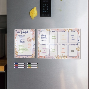 Close-up of magnetic acrylic weekly planner and to-do list with 6 markers on a fridge