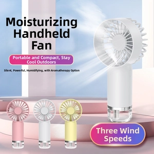 Detail of handheld misting fan showing water spray function and clear bottom reservoir