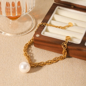 18K gold plated stainless steel chain bracelet with large white pearl on wooden box