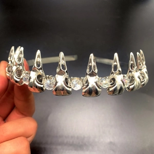 Detailed craftsmanship of Gothic raven skull headband with crystal beads and silver wire