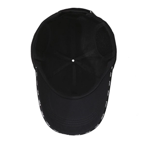 Black winter baseball cap with fleece lining and ear flaps shown from an interior perspective