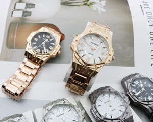 Detailed collection of octagonal quartz watches with metal link straps and decorative screws