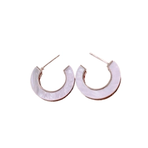 Rose gold C-shaped hoop earrings featuring white shell inlay on a clean white background